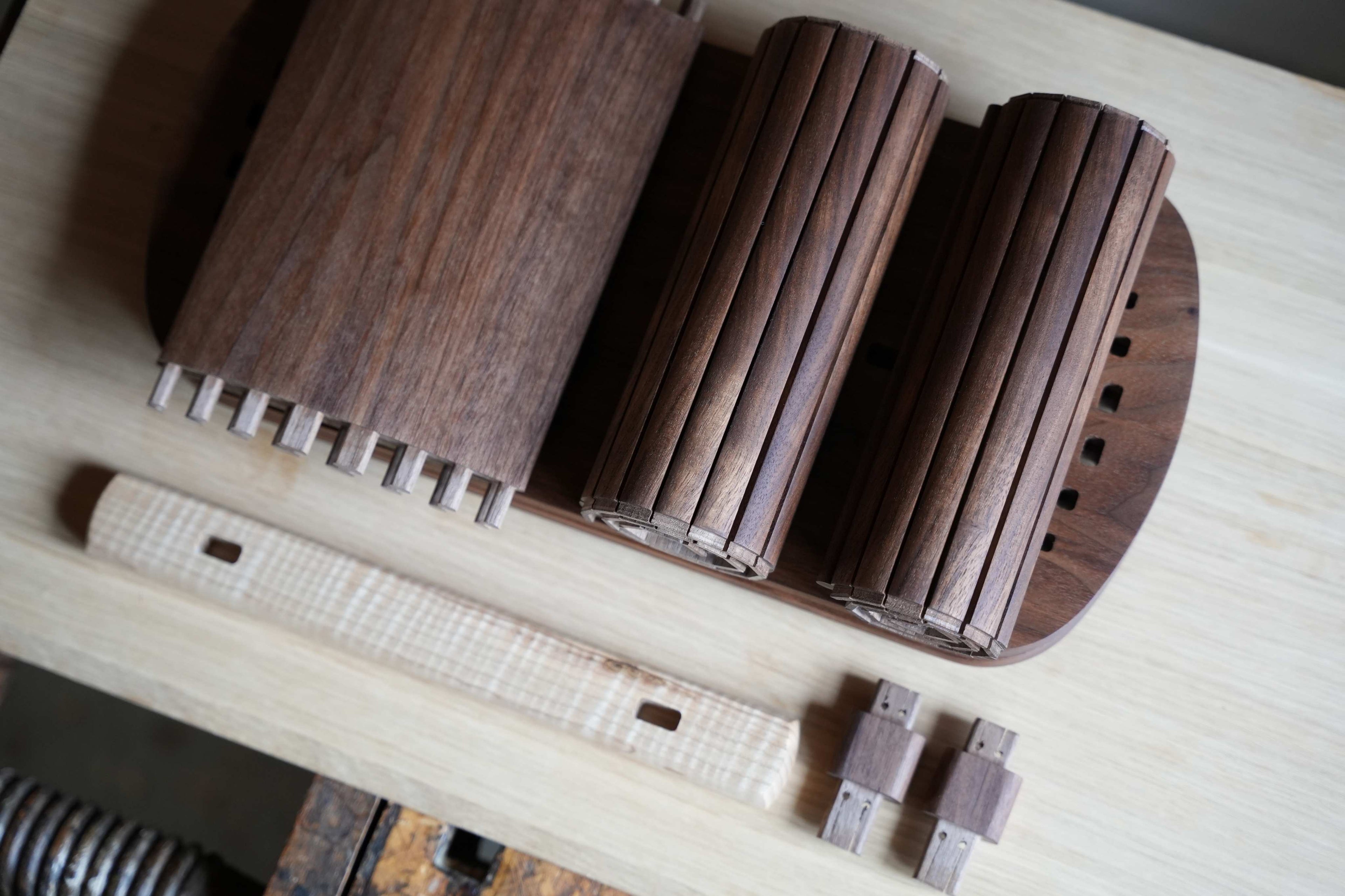 Wooden furniture components on a wooden surface