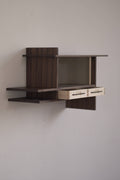 Wall-mounted wooden cabinet with two small drawers on a plain wall.