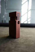 Handcrafted wooden object from od form featuring architectural design and minimalist joinery details.
